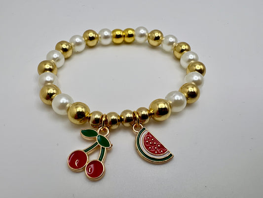 Cute pearly and goldtone fashion jewlery with charms