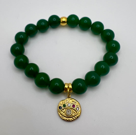Jade bracelet with evil eye charm