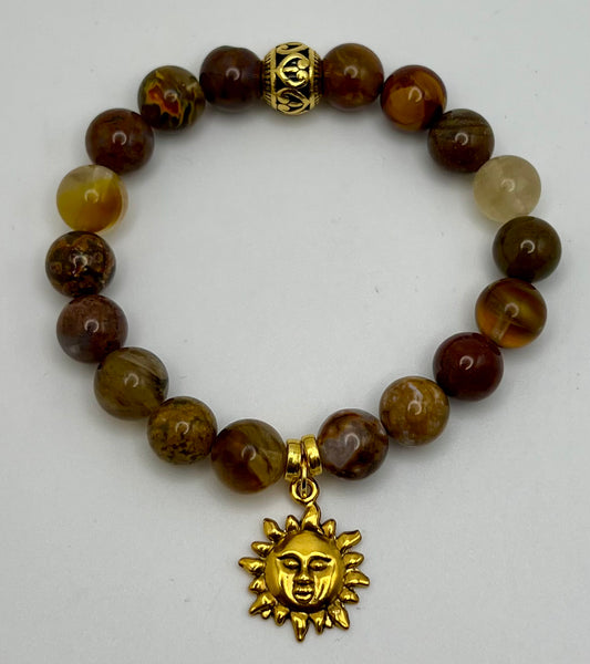 Crystal bead bracelet with  goldtone sun charm