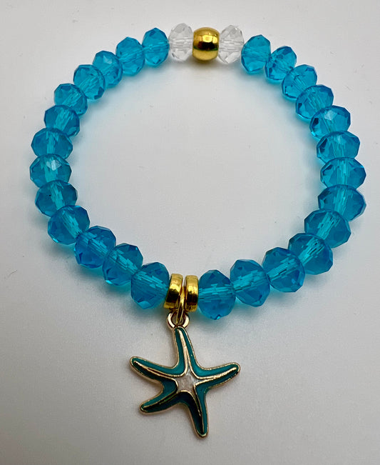 Faceted crystal bracelet with starfish charm